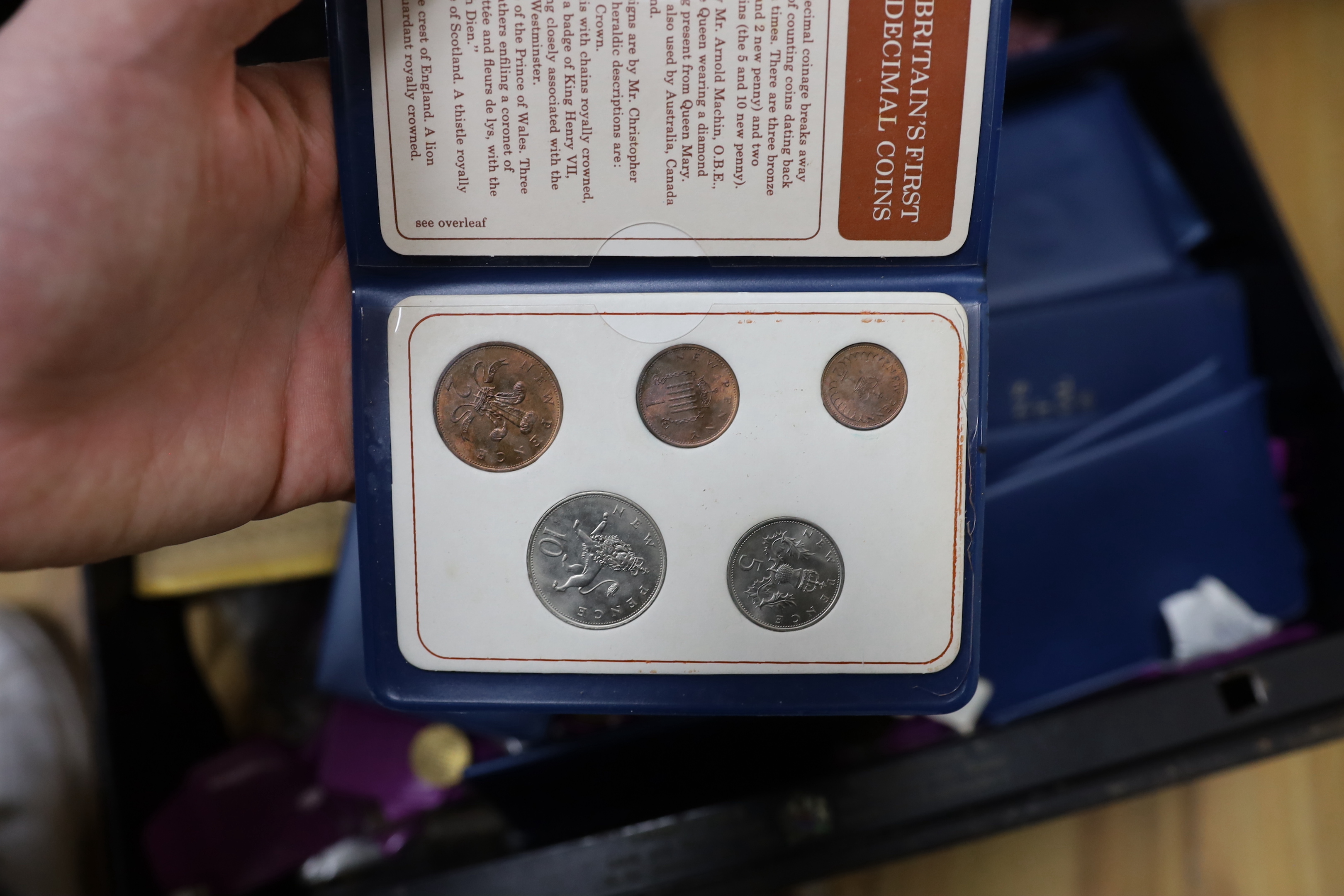 A large quantity of UK coins, mostly George V to Elizabeth II many UNC. in two metal boxes